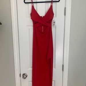 Red cutout dress with slit.